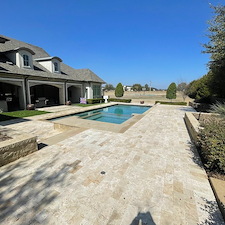 Travertine-Paver-Patio-Cleaning-Softwashing-in-Fairview-TX 0